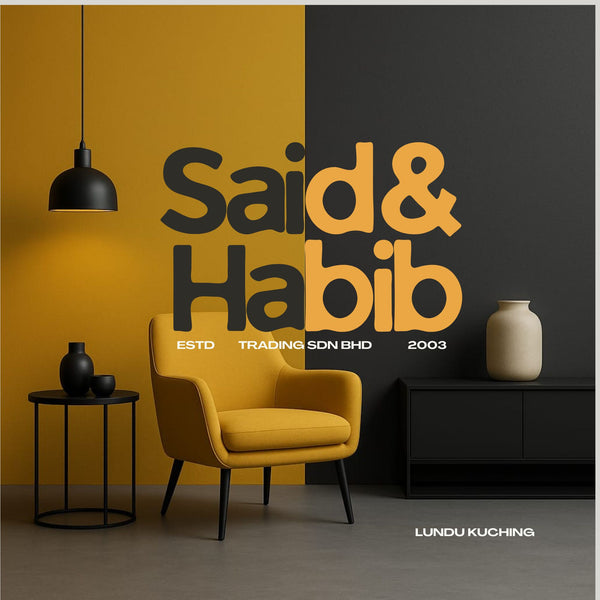 Modern interior design with a yellow armchair, black pendant lamp, and decorative items against a split yellow and black wall with 'Said & Habib' branding.